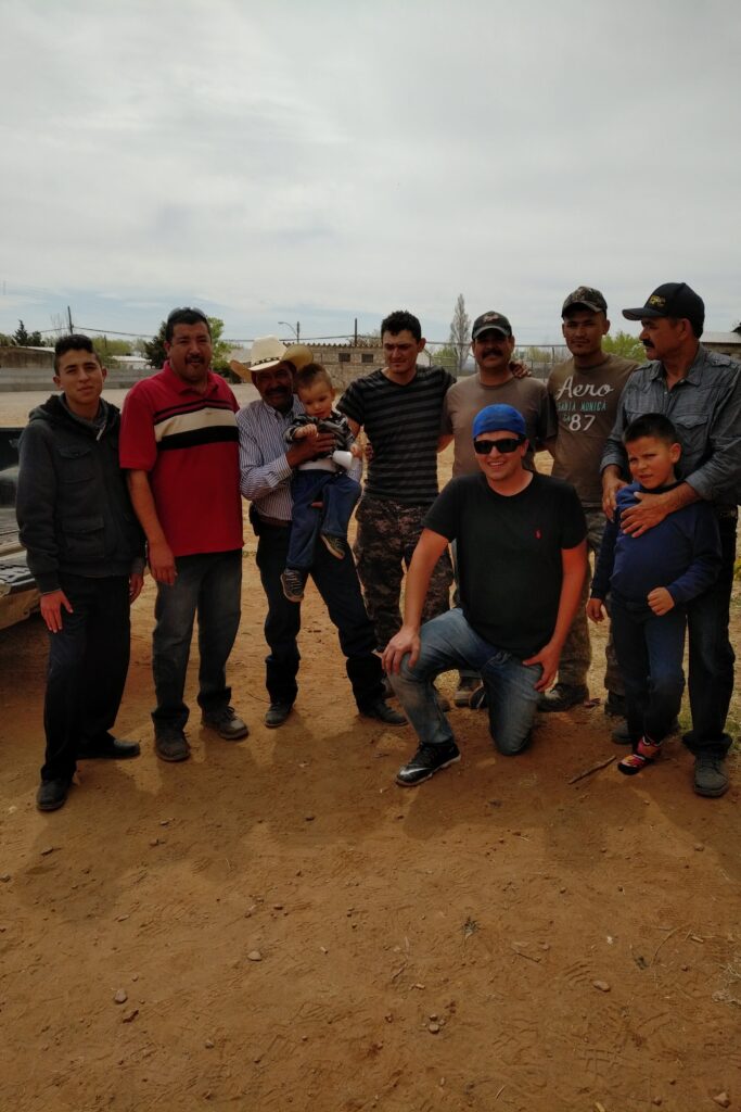 Group of Men Enjoying a Casual Gathering on Road Trip in Rural Chihuahua, Mexico