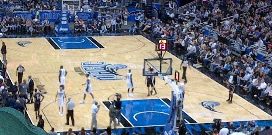 Pacers and Magic showdown during a thrilling professional basketball game with 13 seconds on shot clock.